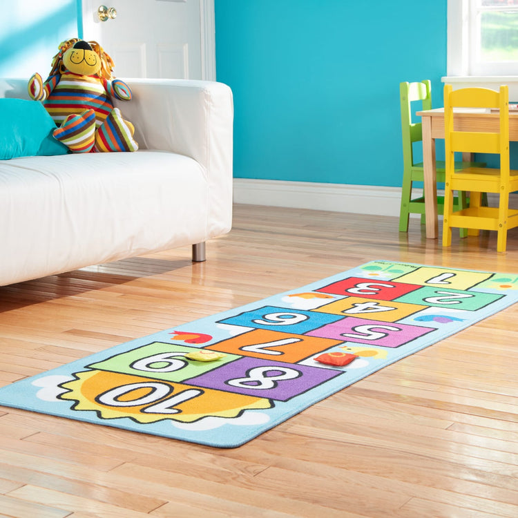 the Melissa & Doug Hop and Count Hopscotch Game Rug  (3 pcs, 78.5 x 26.5 inches)