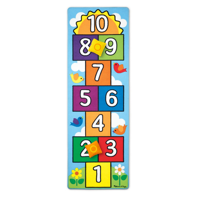 The loose pieces of the Melissa & Doug Hop and Count Hopscotch Game Rug  (3 pcs, 78.5 x 26.5 inches)