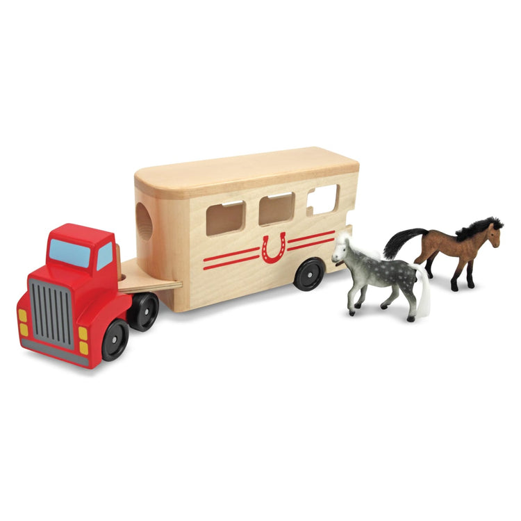 The loose pieces of the Melissa & Doug Horse Carrier Wooden Vehicle Play Set With 2 Flocked Horses and Pull-Down Ramp