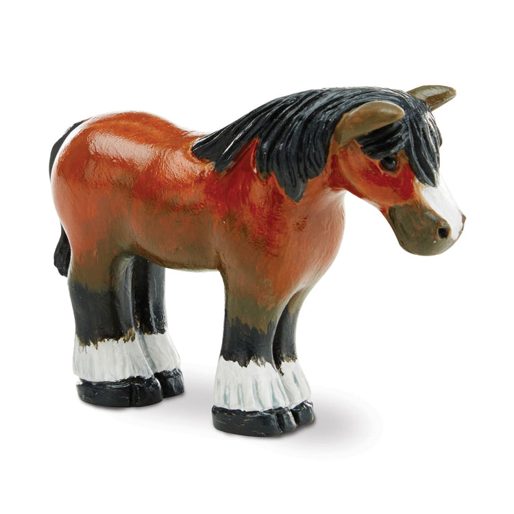 The front of the box for the Melissa & Doug Created by Me! Horse Figurines Craft Kit (2 Resin Horses, 6 Paints, Paintbrush)