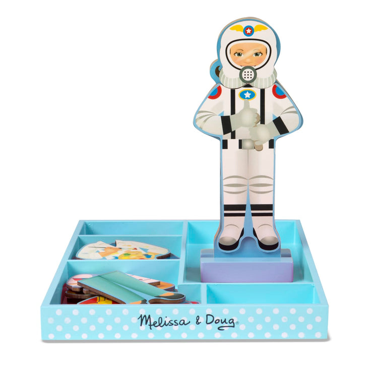 The loose pieces of the Melissa & Doug Julia Magnetic Dress-Up Wooden Doll Pretend Play Set (25+ pcs)