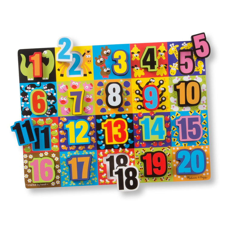 T child on white background with the Melissa & Doug Jumbo Numbers Wooden Chunky Puzzle (20 pcs)