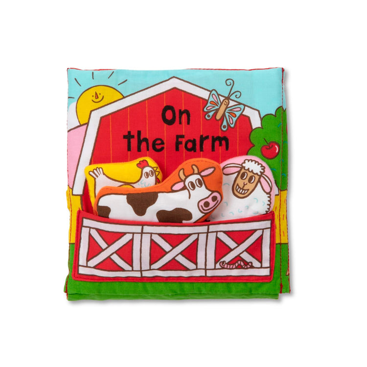 The loose pieces of the Melissa & Doug K’s Kids On the Farm 8-Page Soft Activity Book for Babies and Toddlers