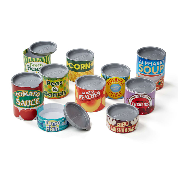 The loose pieces of the Melissa & Doug Let's Play House! Grocery Cans Play Food Kitchen Accessory - 10 Stackable Cans With Removable Lids