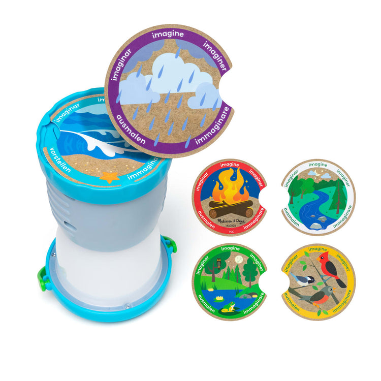 The loose pieces of the Melissa & Doug Let’s Explore™ Light & Sound Camping Lantern Play Set