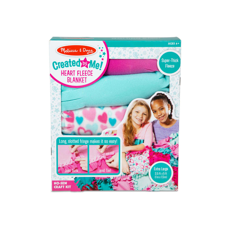 The front of the box for the Melissa & Doug Created by Me! Heart Fleece Blanket No-Sew Craft Kit (40 squares, 3.5 feet x 5 feet)