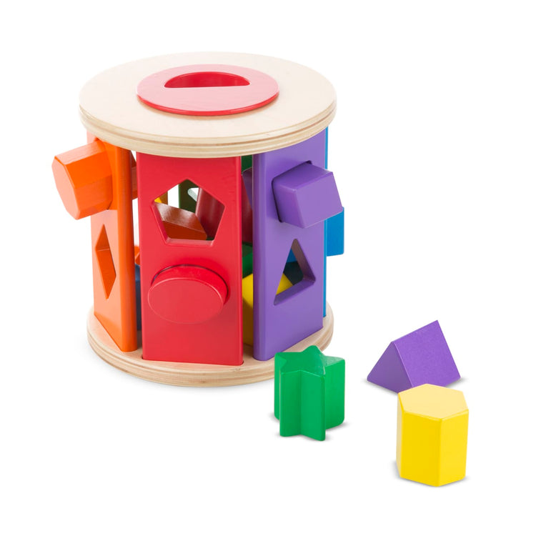 The loose pieces of the Melissa & Doug Match and Roll Shape Sorter - Classic Wooden Toy
