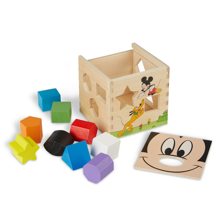 The loose pieces of the Mickey Mouse & Friends Wooden Shape Sorting Cube