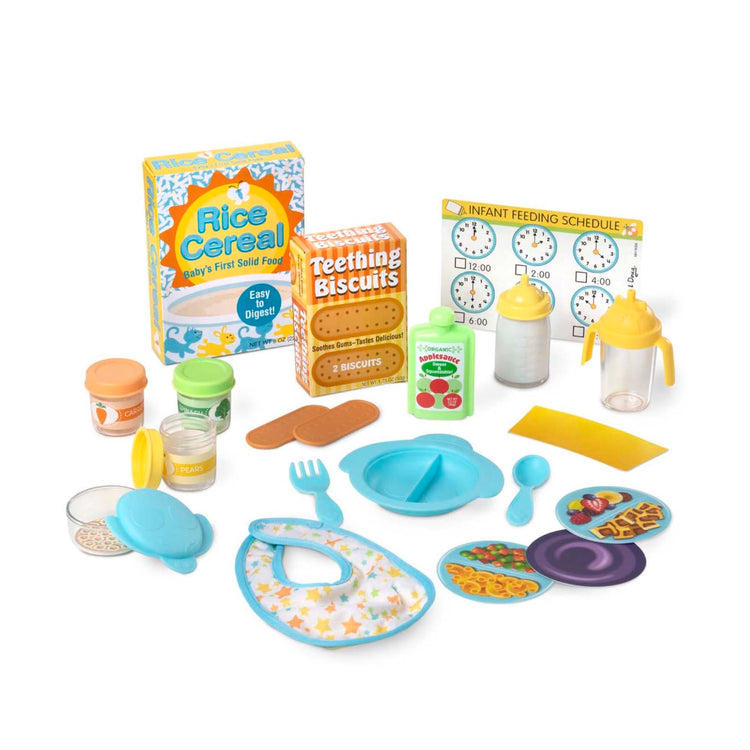 The loose pieces of the Melissa & Doug Mine to Love Deluxe Baby Care Play Set (48 Pieces – Doll + Accessories to Feed, Bathe, Change, and Cuddle)