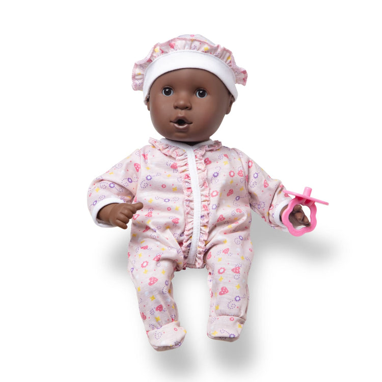 The loose pieces of the Melissa & Doug Mine to Love Gabrielle 12" Poseable Baby Doll With Romper, Hat, Pacifier