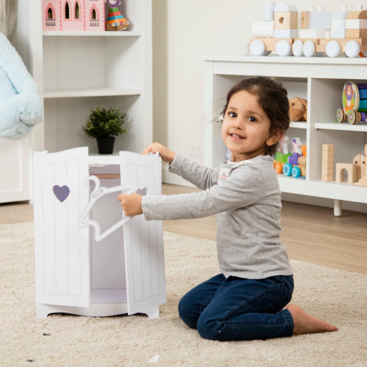 https://www.melissaanddoug.com/cdn/shop/products/Mine-to-Love-Play-Armoire-031723-1-Kid-Lifestyle_3be7c761-a4a8-470a-9f41-88949c95f125.jpg?v=1664901484&width=750