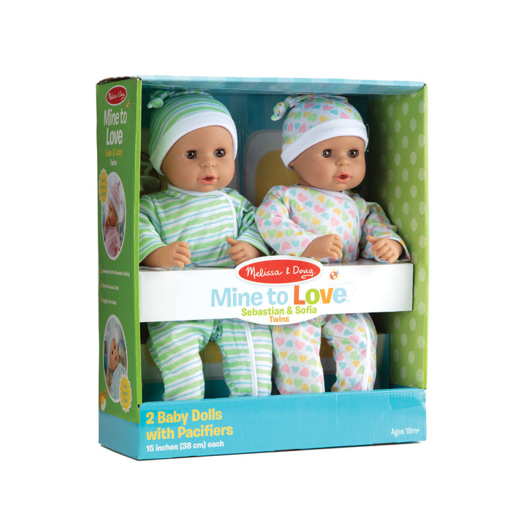The front of the box for the Melissa & Doug Mine to Love Twins Sebastian & Sofia 15” Medium Skin-Tone Boy and Girl Baby Dolls with Rompers, Caps, Pacifiers