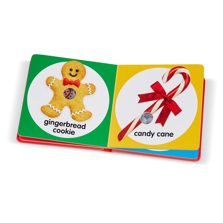 The loose pieces of the Melissa & Doug Children’s Book – Poke-a-Dot: Christmas (Board Book with Buttons to Pop)