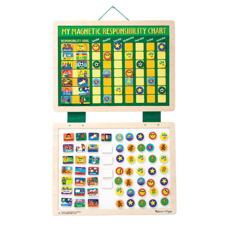 The loose pieces of the Melissa & Doug Deluxe Wooden Magnetic Responsibility Chart With 90 Magnets