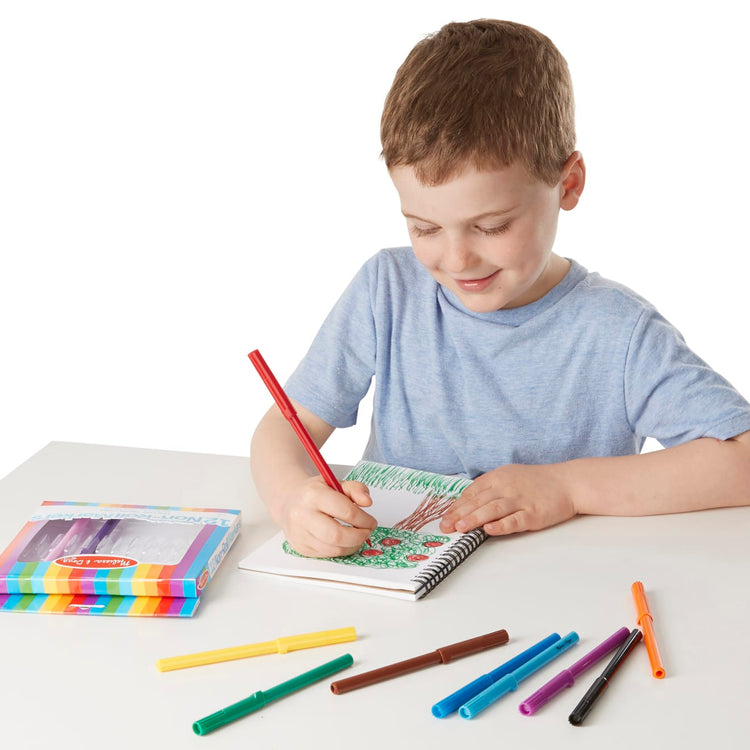 A child on white background with the Melissa & Doug Art Essentials Marker Set - 12 Non-Roll Washable Markers