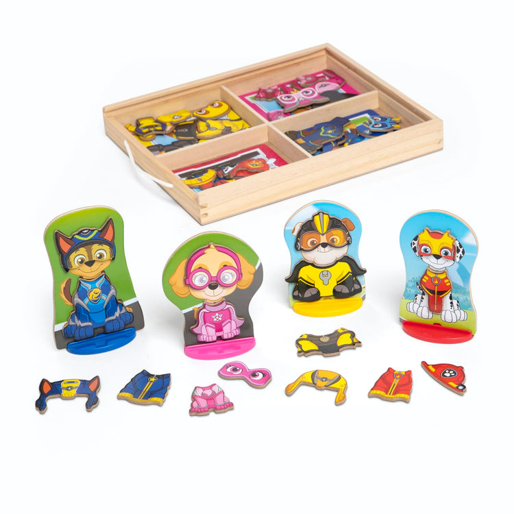 The loose pieces of the Melissa & Doug PAW Patrol Wooden Magnetic Pretend Play (64 Pieces)