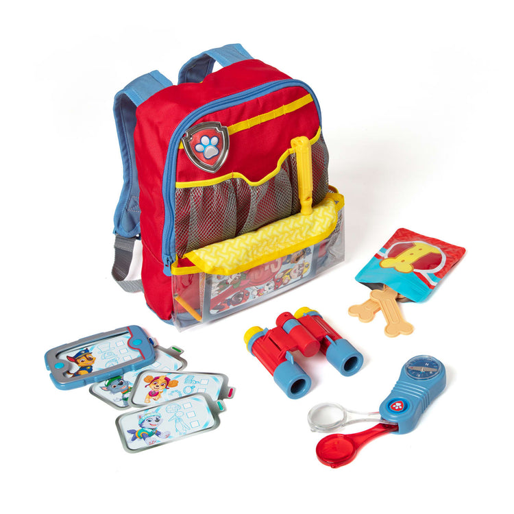 The loose pieces of the Melissa & Doug PAW Patrol Pup Pack Backpack Role Play Set (15 Pieces)