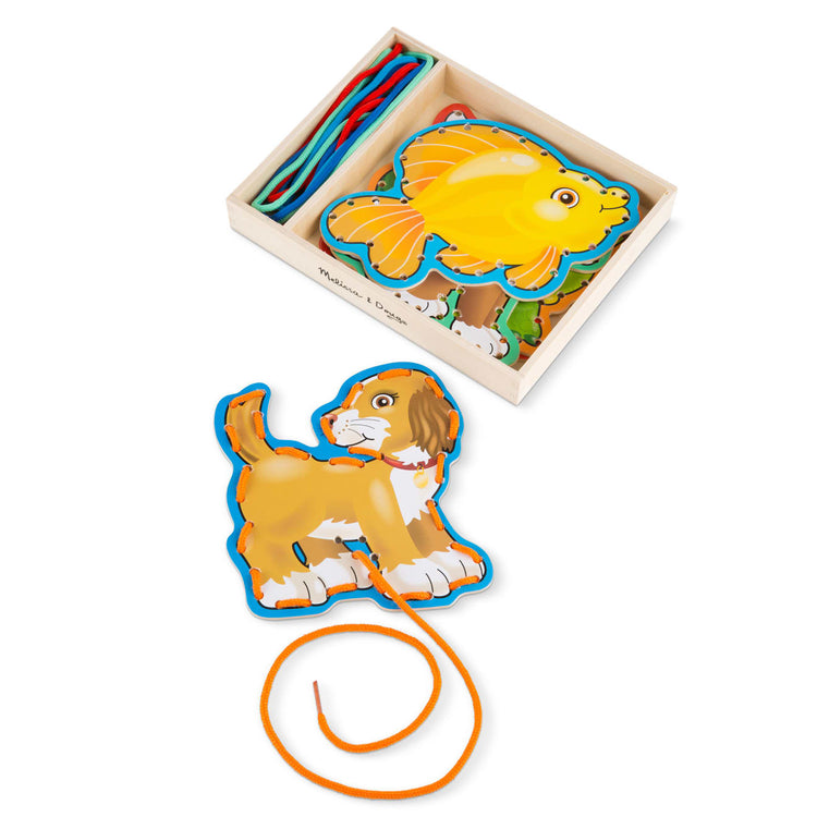 The loose pieces of the Melissa & Doug Lace and Trace Activity Set: Pets - 5 Wooden Panels and 5 Matching Laces