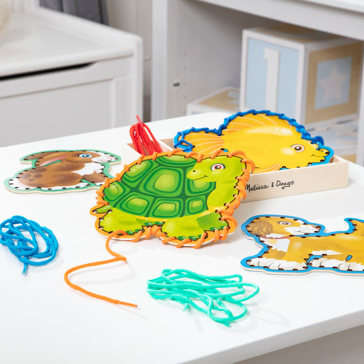 the Melissa & Doug Lace and Trace Activity Set: Pets - 5 Wooden Panels and 5 Matching Laces