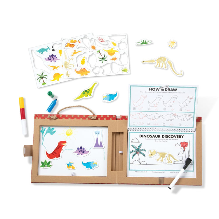The loose pieces of the Melissa & Doug Natural Play: Play, Draw, Create Reusable Drawing & Magnet Kit – Dinosaurs (41 Magnets, 5 Dry-Erase Markers)