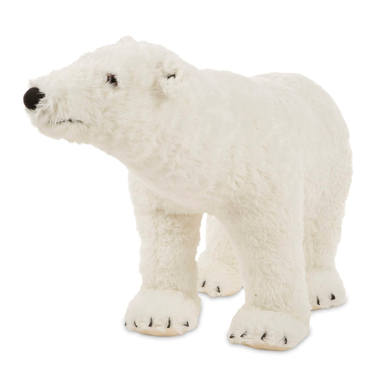 The loose pieces of the Melissa & Doug Giant Polar Bear - Lifelike Stuffed Animal (nearly 3 feet long)