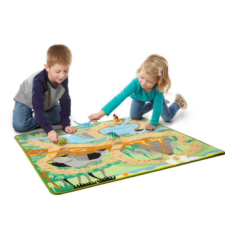 A child on white background with the Melissa & Doug Prehistoric Playground Dinosaur Activity Rug (39 x 36 inches) - 4 Toy Animals