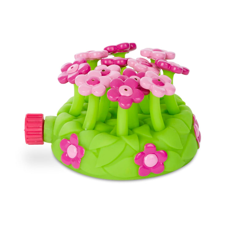 The loose pieces of the Melissa & Doug Sunny Patch Pretty Petals Flower Sprinkler Toy With Hose Attachment