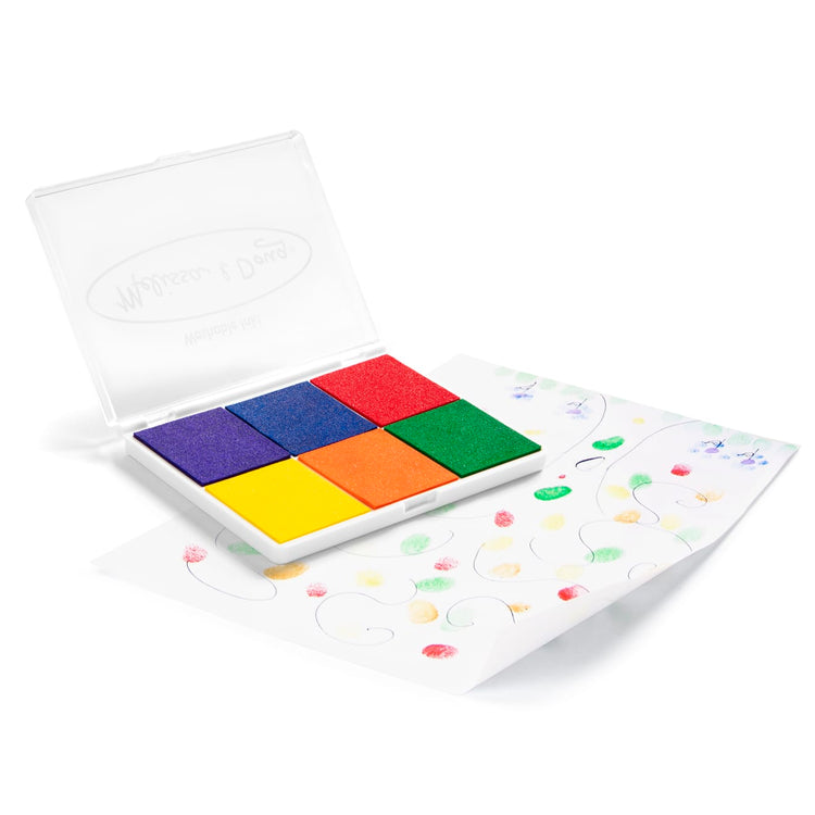 The loose pieces of the Melissa & Doug Rainbow Stamp Pad - 6 Washable Inks