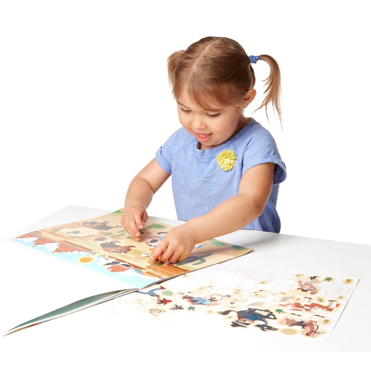 A child on white background with the Melissa & Doug Reusable Sticker Pads Set: Adventure - 245+ Stickers