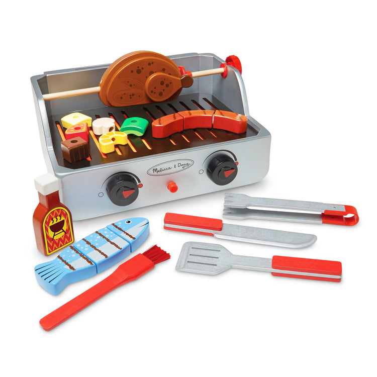 The loose pieces of the Melissa & Doug Rotisserie and Grill Wooden Barbecue Play Food Set (24 pcs)