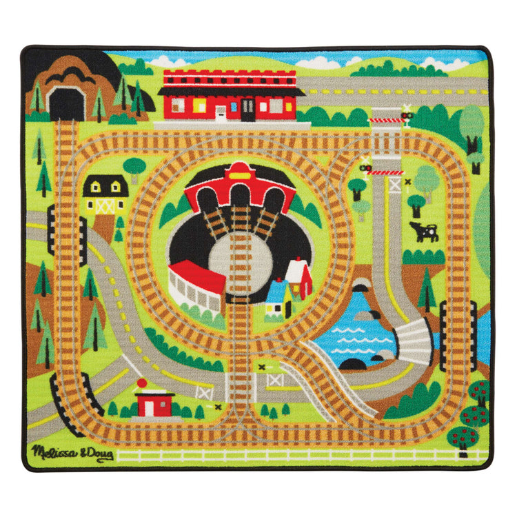 The loose pieces of the Melissa & Doug Round the Rails Train Rug With 3 Linking Wooden Train Cars  (39 x 36 inches)