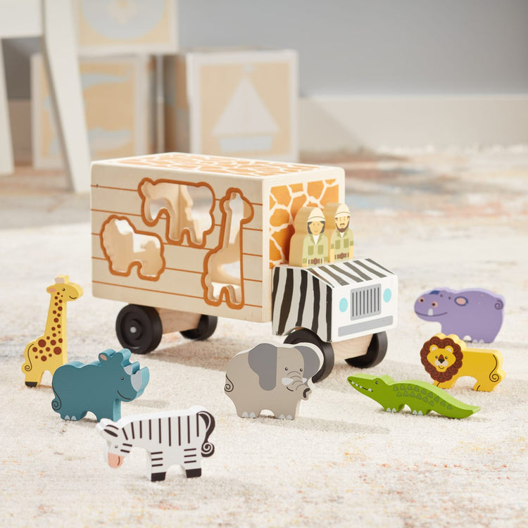 the Melissa & Doug Animal Rescue Shape-Sorting Truck - Wooden Toy With 7 Animals and 2 Play Figures