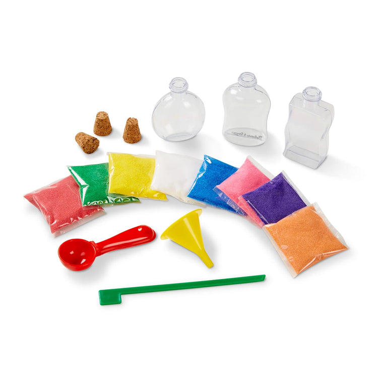 The loose pieces of the Melissa & Doug Created by Me! Sand Art Bottles Craft Kit: 3 Bottles, 6 Bags of Colored Sand, Design Tool