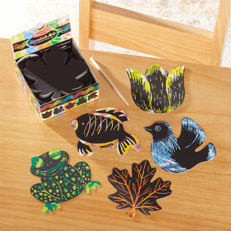 the Melissa & Doug Scratch Art® Box of 125 Nature-Themed Shaped Notes in Desktop Dispenser (Approx. 3.5” x 3.5” Each Note)