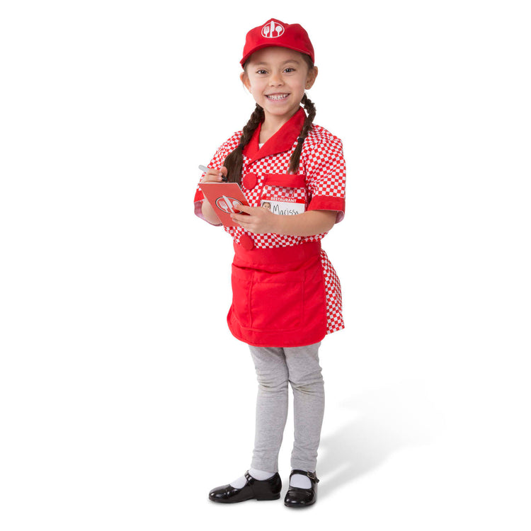 A kid playing with the Melissa & Doug Server Costume Role Play Dress-Up Set With Realistic Accessories
