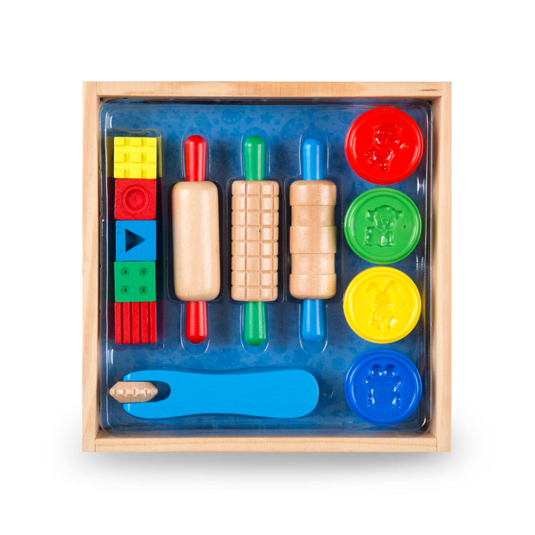 The front of the box for the Melissa & Doug Shape, Model, and Mold Clay Activity Set - 4 Tubs of Modeling Dough and Tools