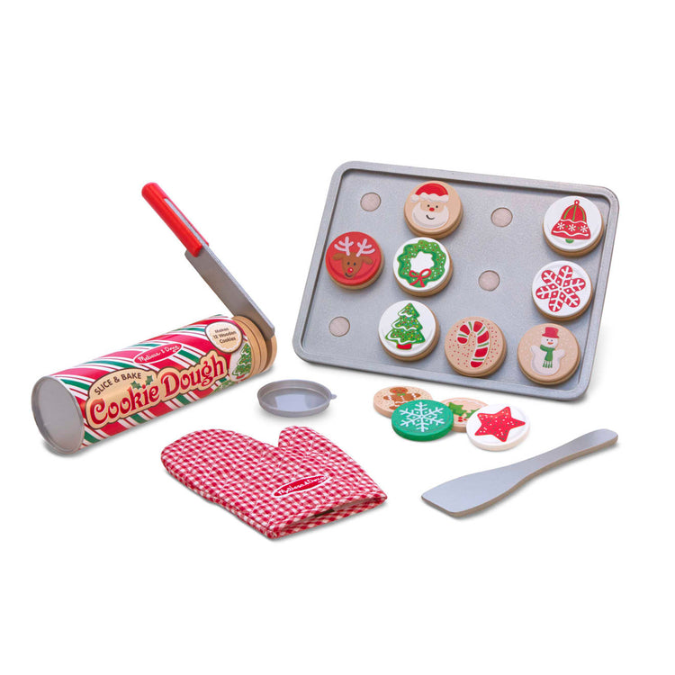 The loose pieces of the Melissa & Doug Slice and Bake Wooden Christmas Cookie Play Food Set