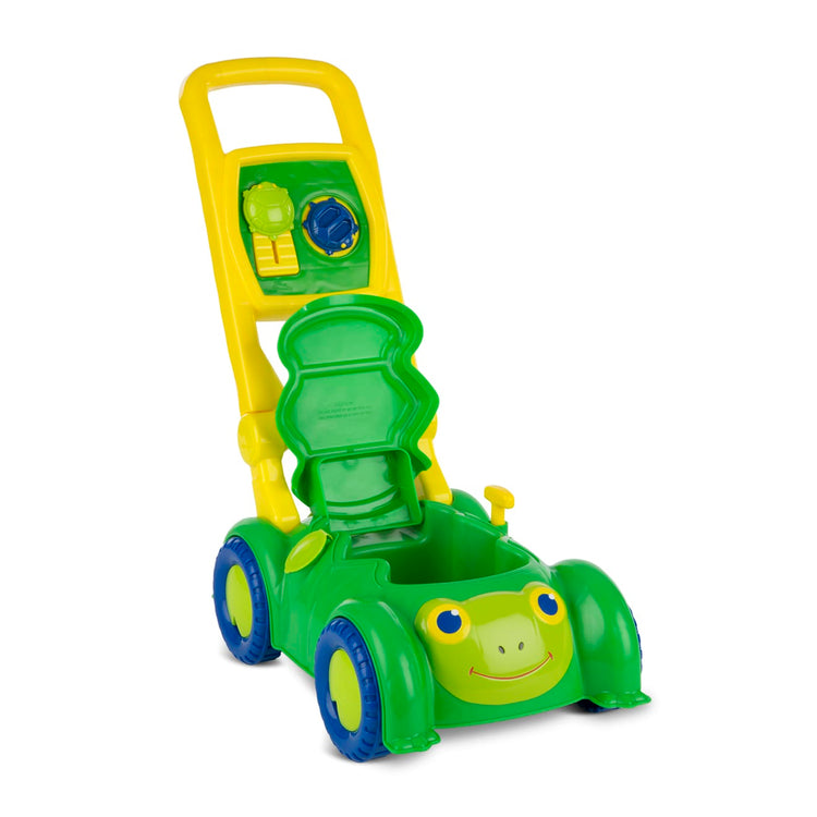 The loose pieces of the Melissa & Doug Sunny Patch Snappy Turtle Lawn Mower - Pretend Play Toy for Kids