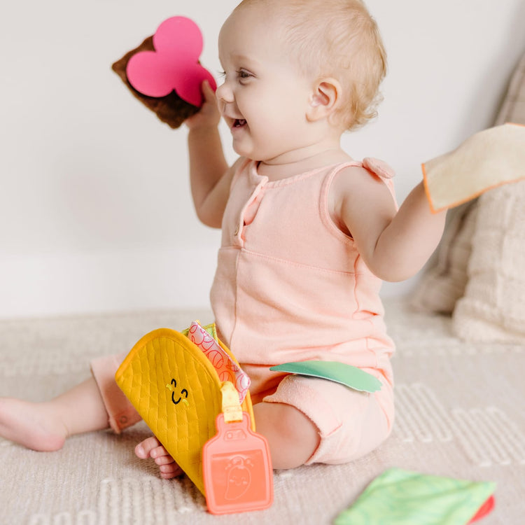 Melissa & Doug Multi-Sensory Soft Taco Fill & Spill Infant Toy