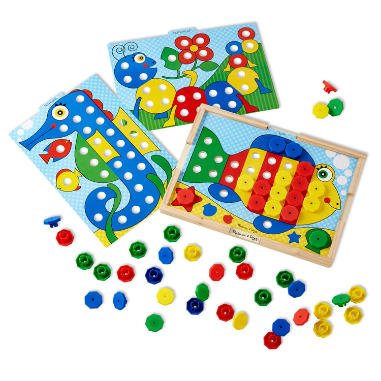 The loose pieces of the Melissa & Doug Sort and Snap Color Match - Sorting and Patterns Educational Toy