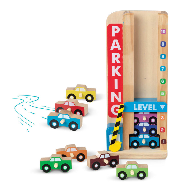 The loose pieces of the Melissa & Doug Stack & Count Wooden Parking Garage With 10 Cars