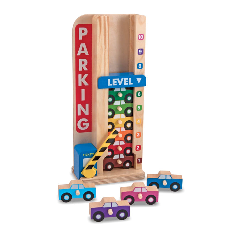 The loose pieces of the Melissa & Doug Stack & Count Wooden Parking Garage With 10 Cars