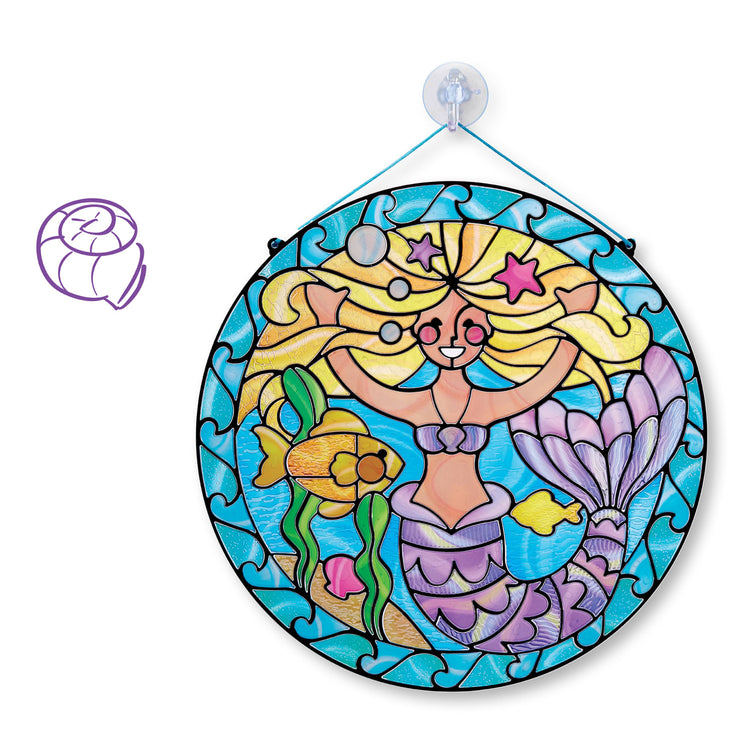 The loose pieces of the Melissa & Doug Stained Glass Made Easy Activity Kit: Mermaids - 140+ Stickers