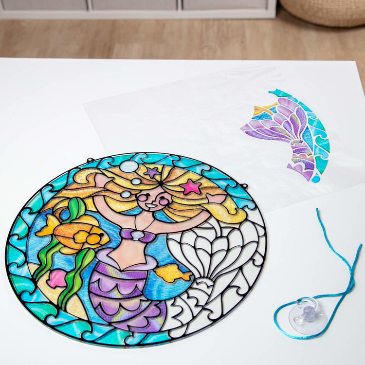 https://www.melissaanddoug.com/cdn/shop/products/Stained-Glass-Mermaid-009292-1-Product-Only-Lifestyle.jpg?v=1664908992&width=750