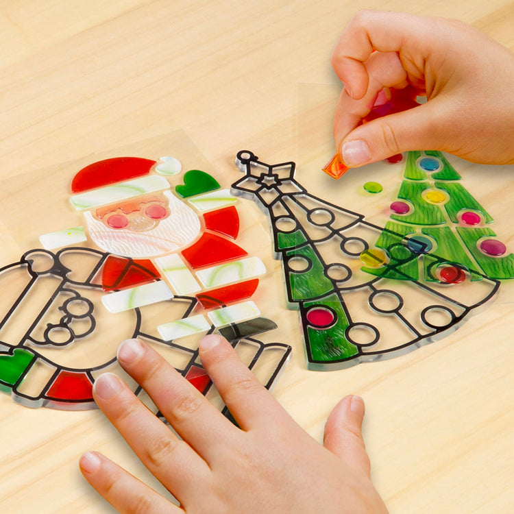 the Melissa & Doug Stained Glass Made Easy Craft Kit - Santa and Tree Ornaments