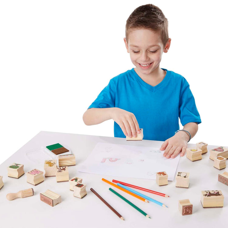 A child on white background with the Melissa & Doug Stamp-a-Scene Wooden Stamp Set: Farm - 20 Stamps, 5 Colored Pencils, and 2-Color Stamp Pad