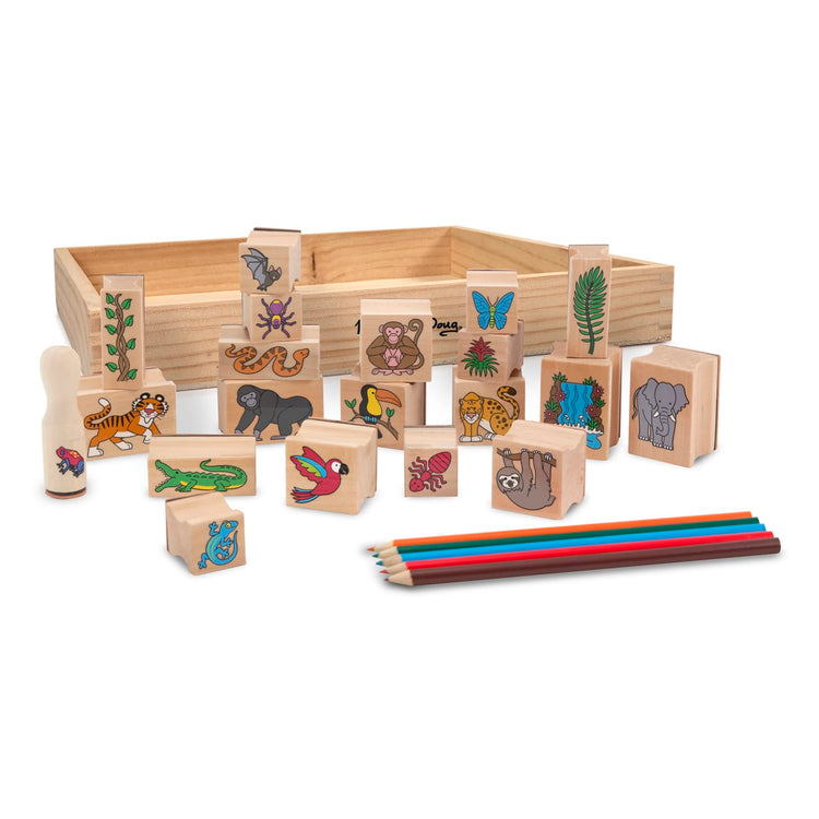 The loose pieces of the Melissa & Doug Stamp-a-Scene Stamp Set: Rain Forest - 20 Wooden Stamps, 5 Colored Pencils, and 2-Color Stamp Pad