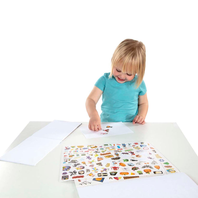 A child on white background with the Melissa & Doug Sticker Collection Book: 1,000+ Stickers – Seasons and Celebrations
