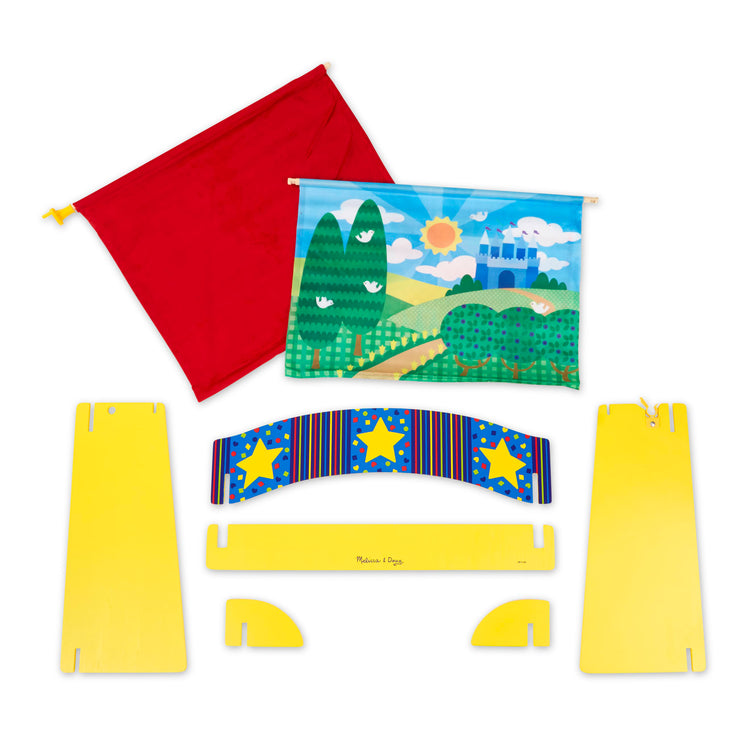 The loose pieces of the Melissa & Doug Tabletop Puppet Theater - Sturdy Wooden Construction