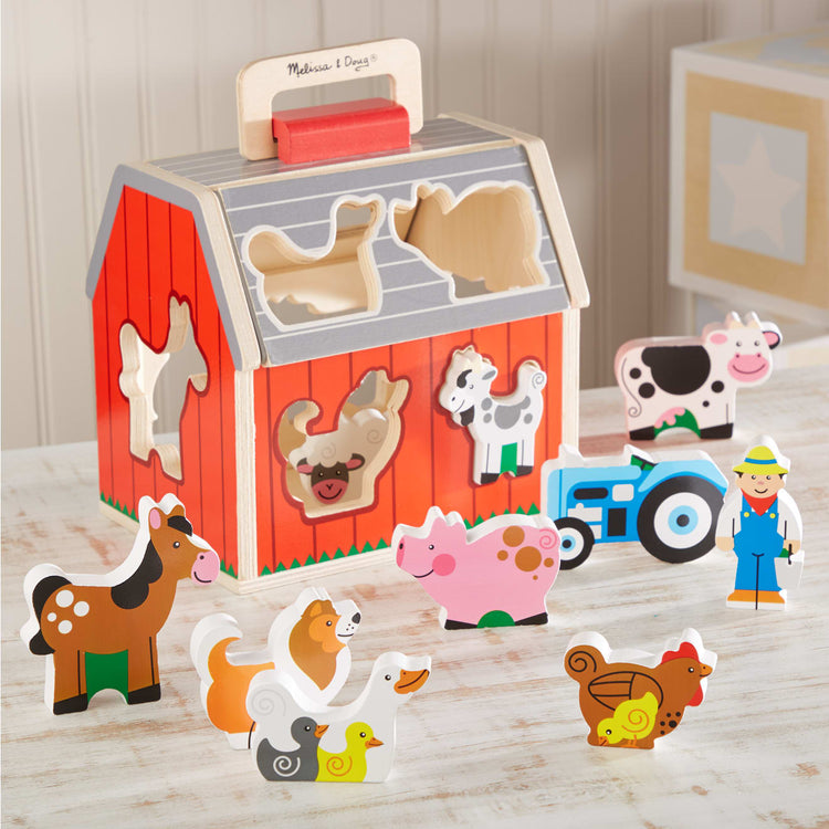 Melissa & Doug Wooden Take-Along Sorting Barn Toy with Flip-Up Roof and Handle, 10 Wooden Farm Play Pieces